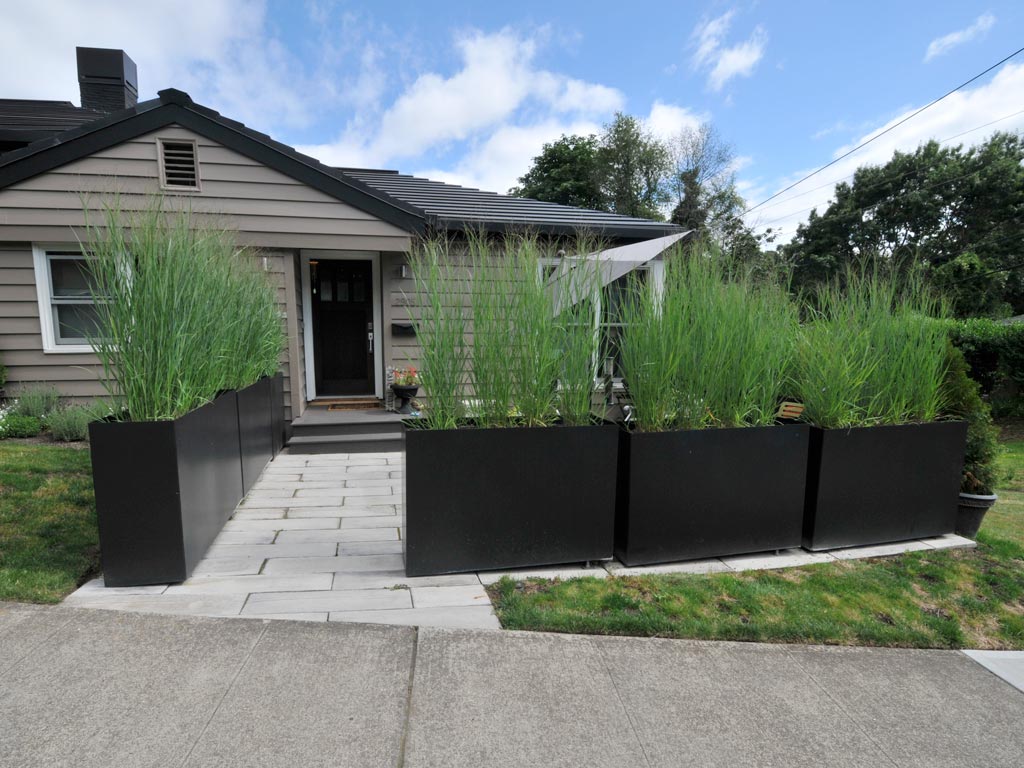 Metal Planters define and outdoor patio