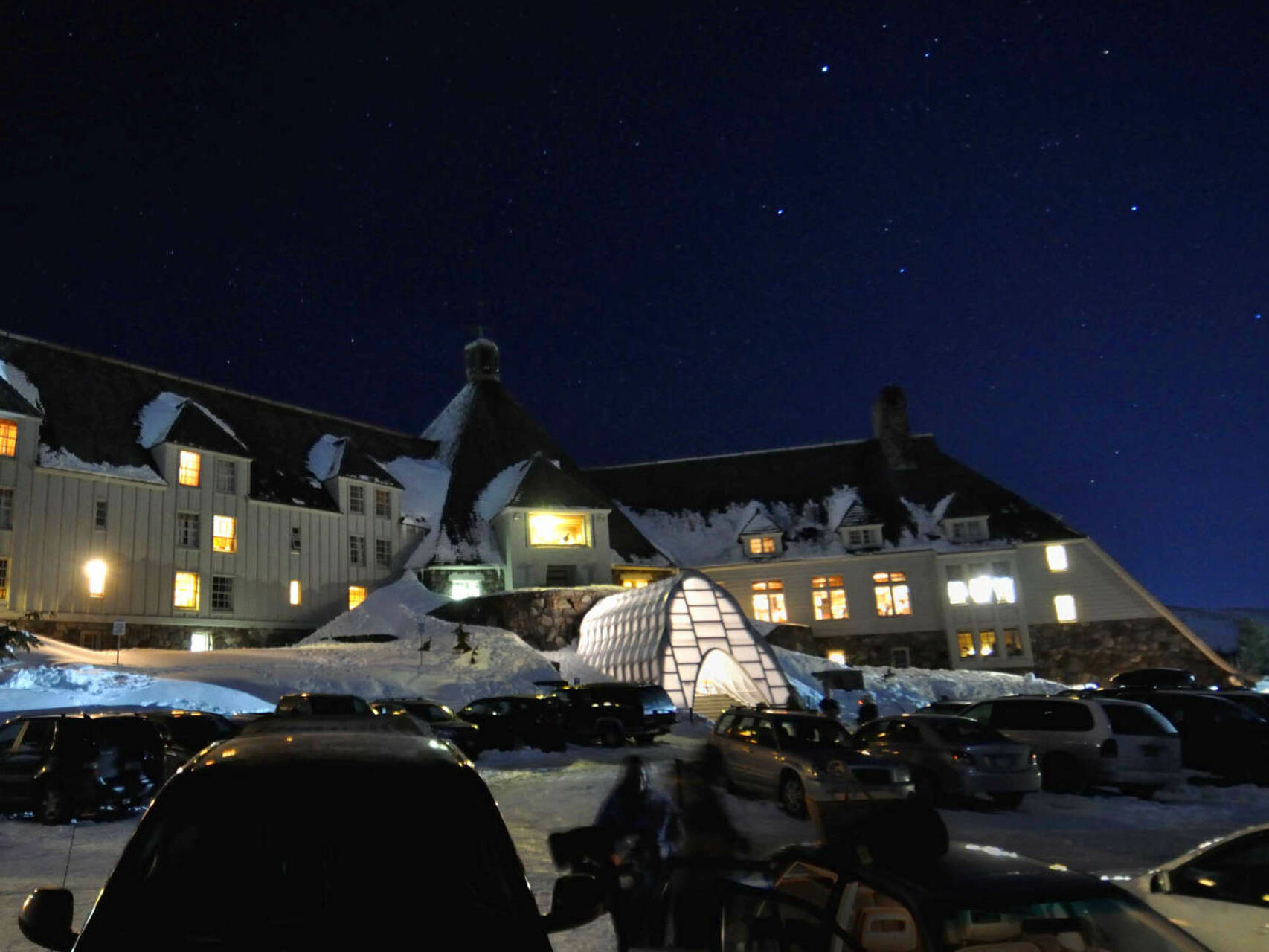 Historic Timberline Lodge Winter Entrance, an illuminated alpine beacon.