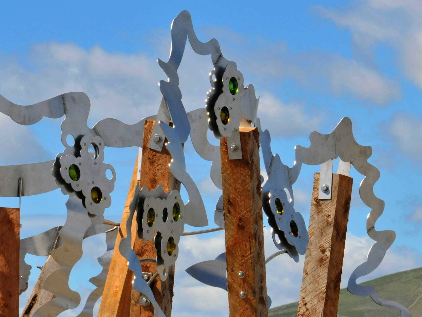 Waves of Viticulture -detail w glass wine bottle bottoms