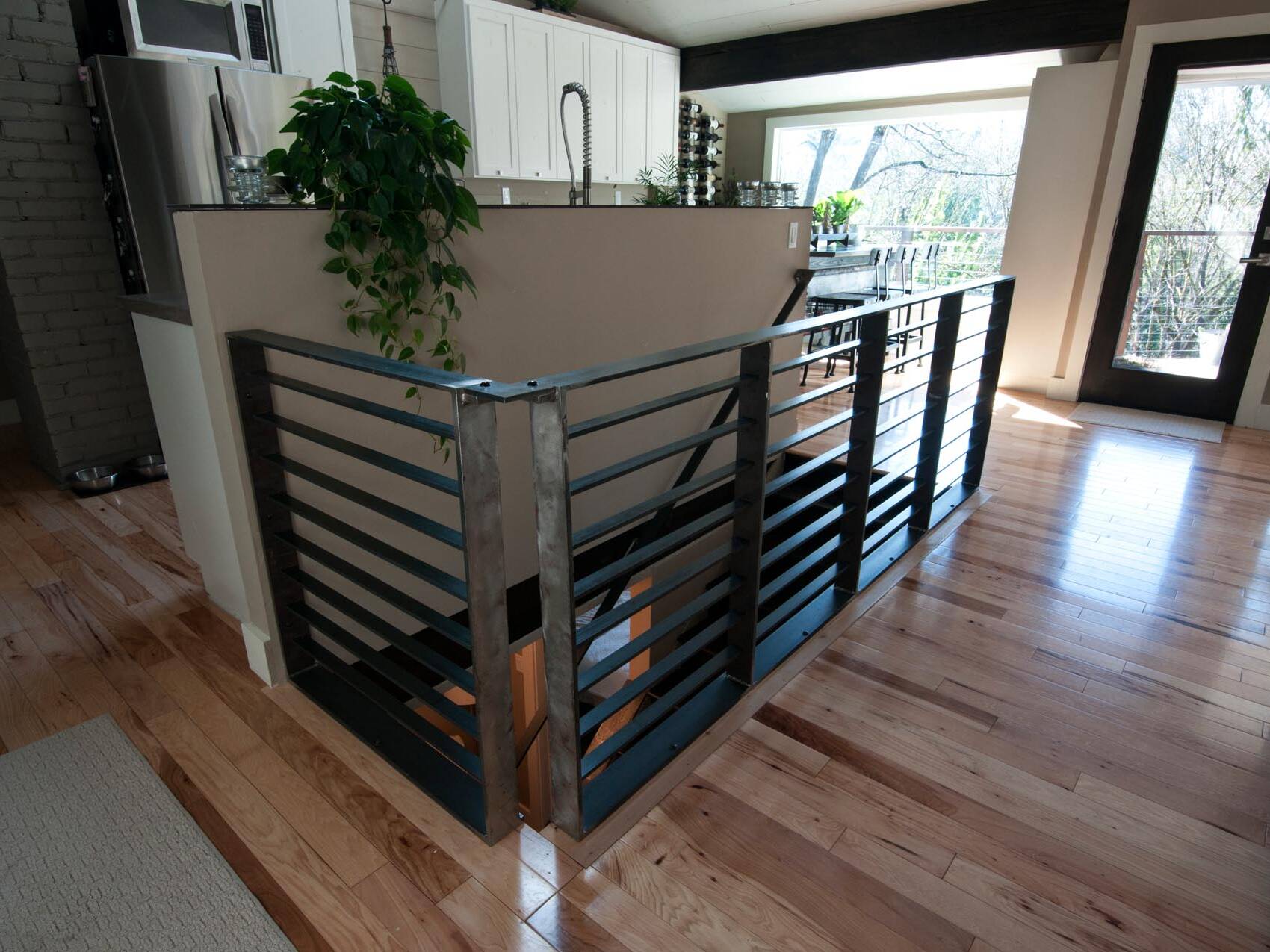 Mid-Century ranch renovation designed and engineered by rhiza A+D Stair detail
